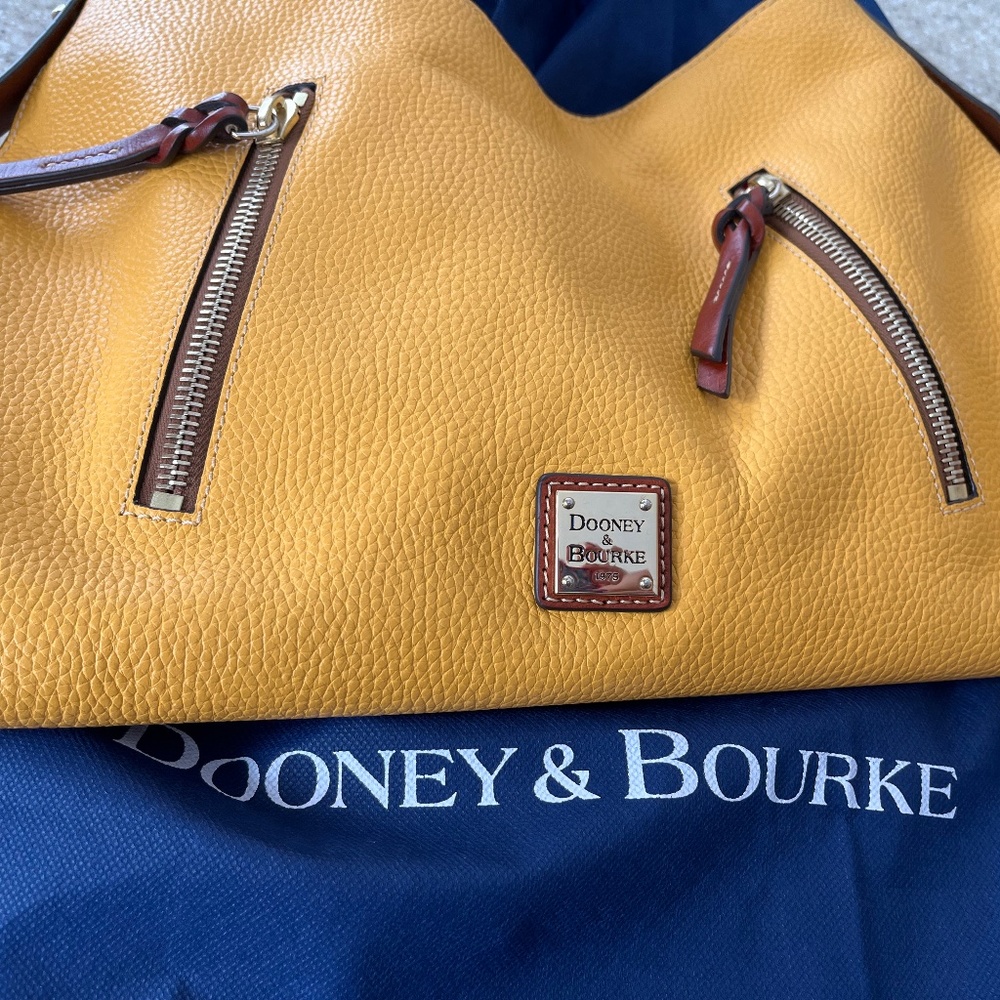 DANDELION DOONEY COOPER  Best handbag ever!!! I bought 10 different colors! 😆🙄